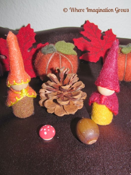 Fall nature table with DIY gnomes, acorns, and leaves! Perfect for fall nature exploration!