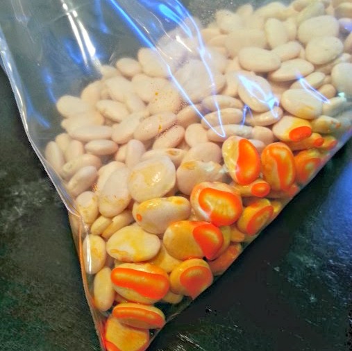 Halloween Sensory Bin with Dyed Beans