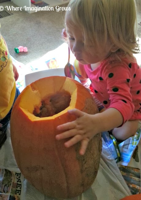 Hammering Nails into Pumpkins with Toddlers! Create unique jack-o-lanterns with kids!