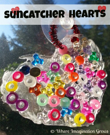 Easy Valentine's Day craft for kids! Make this heart suncatcher craft with just glue and beads! Perfect Valentine's art project for both toddlers and preschoolers! 