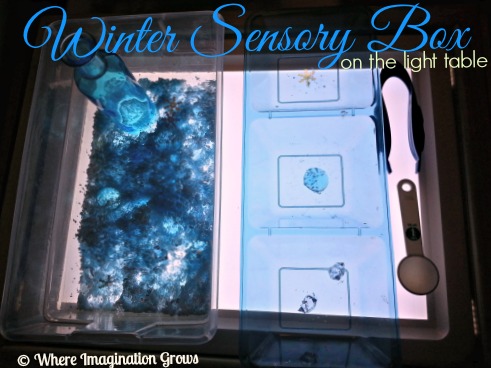 Winter sensory play on the light table! Use fake snow for a fun wintry sensory bin!
