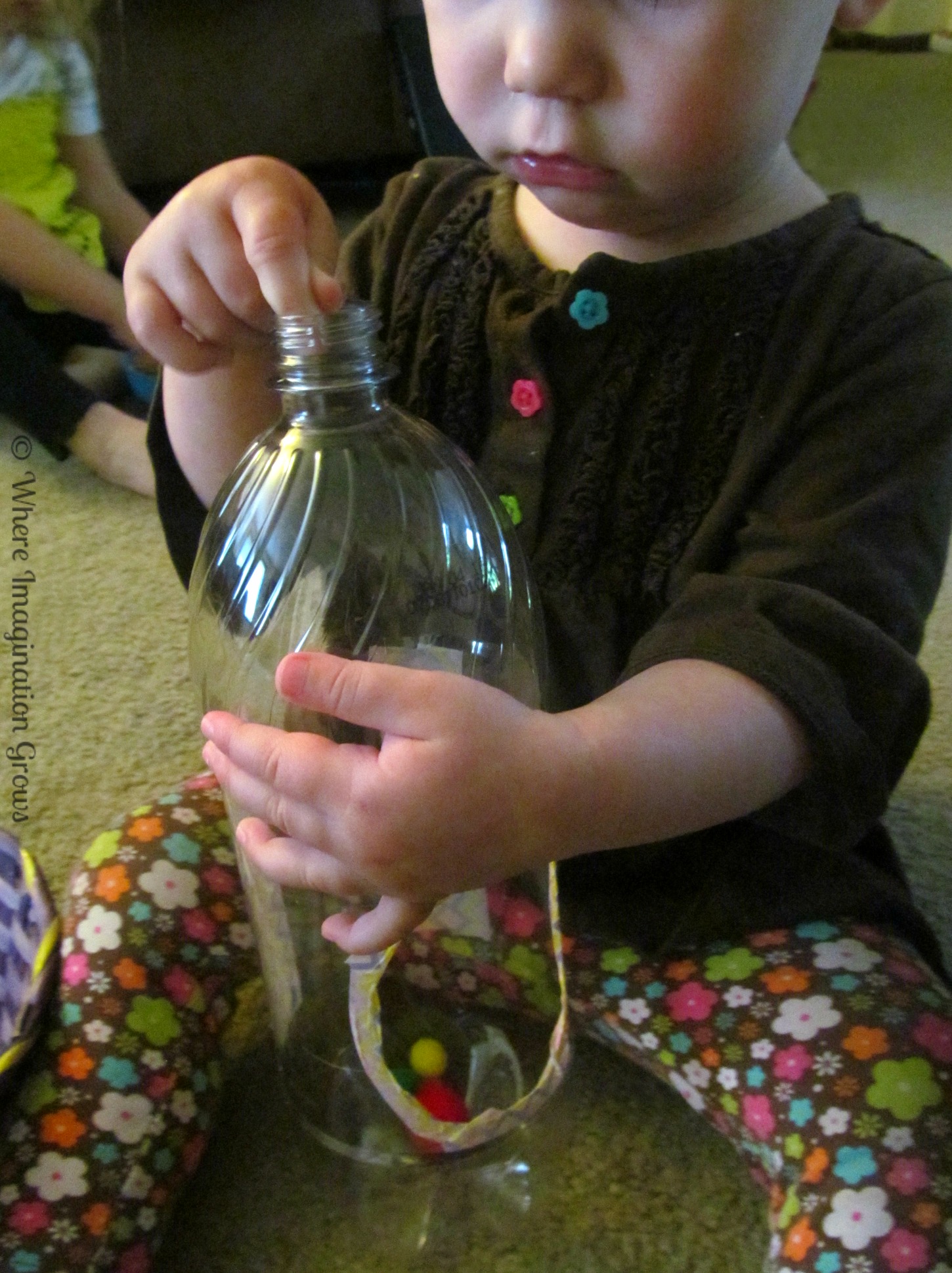 DIY Recycled Pom Pom Drop! Fine motor activities for infants and toddlers