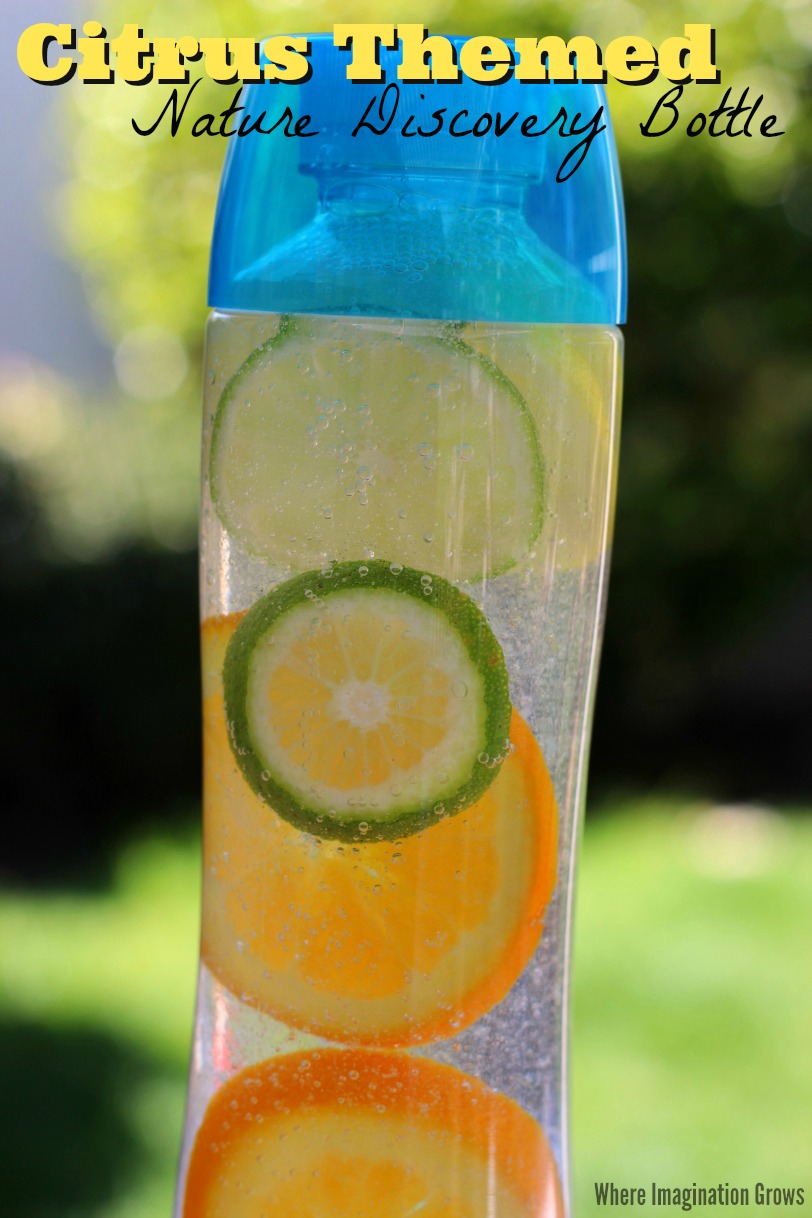 Simple DIY nature discovery bottles for kids to learn about and explore citrus fruits through sensory play