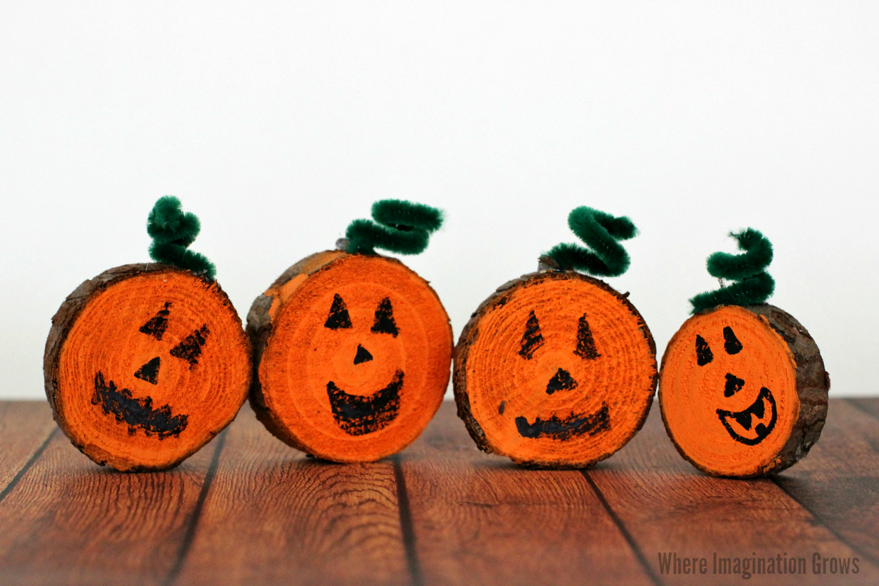 Jack-O-Lanterns made from wood slices